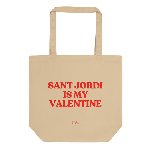 Tote bag de cotó orgànic amb el text "SANT JORDI IS MY VALENTINE" imprès en vermell sobre fons neutre, disseny minimalista de Catalan Words ideal per Sant Jordi.