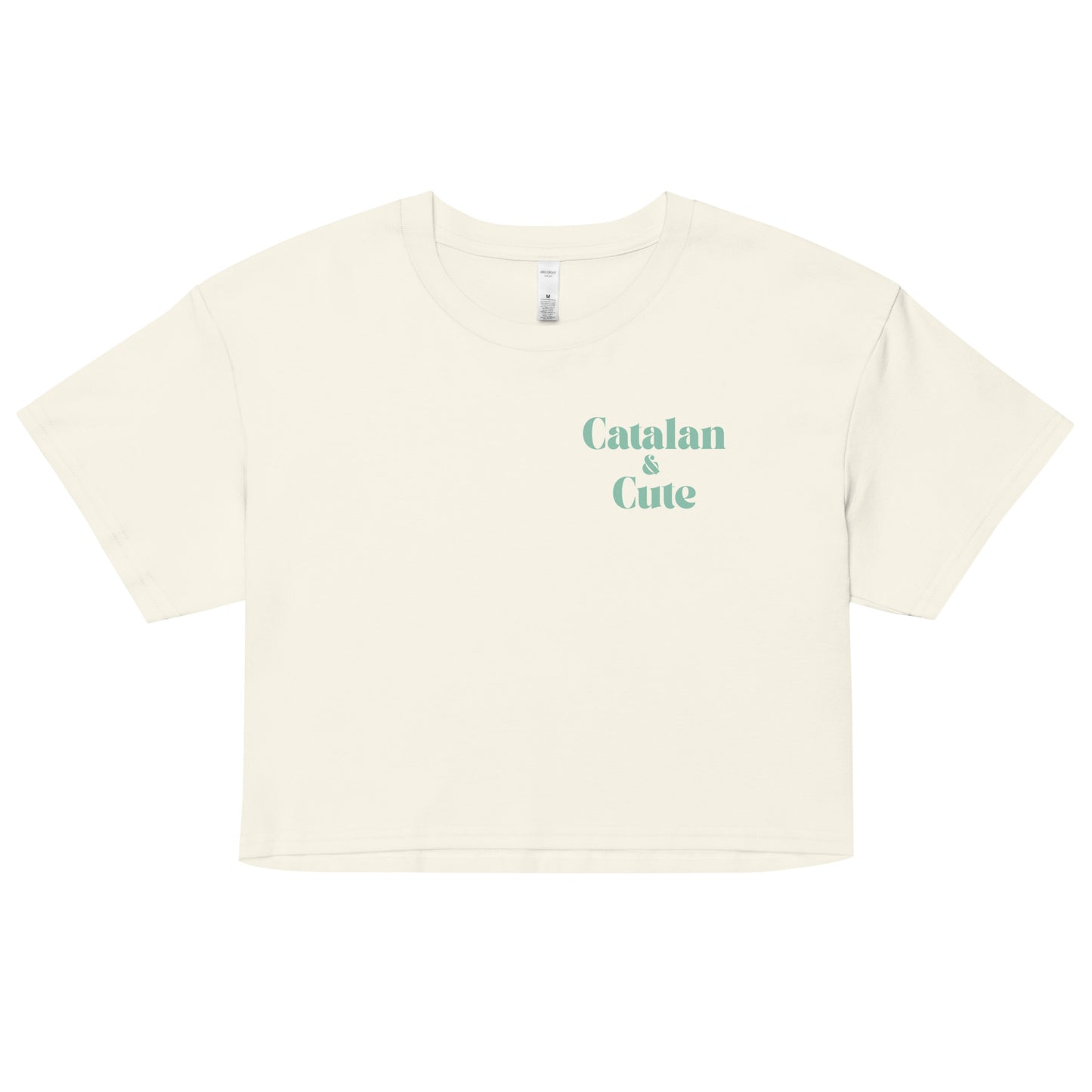 Crop top amb el text "Catalan & Cute" en tipografia arrodonida i estil minimalista, dissenyat per Catalan Words.