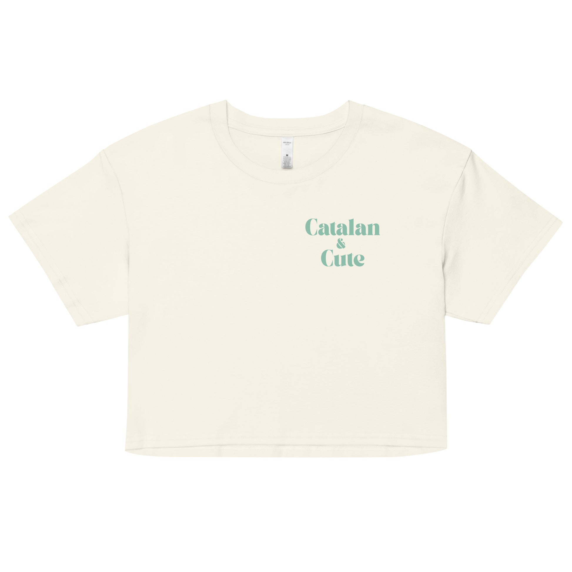 Crop top amb el text "Catalan & Cute" en tipografia arrodonida i estil minimalista, dissenyat per Catalan Words.