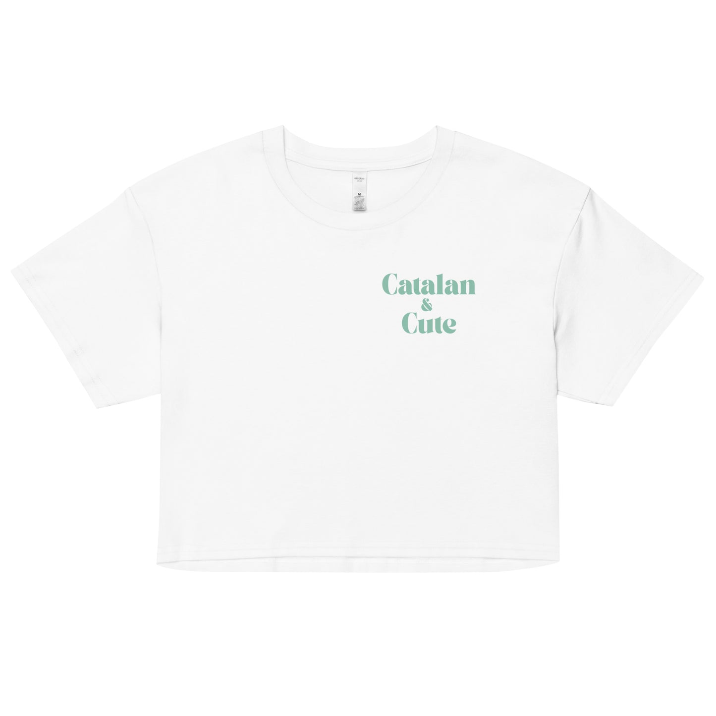 Crop top amb el text "Catalan & Cute" en tipografia arrodonida i estil minimalista, dissenyat per Catalan Words.